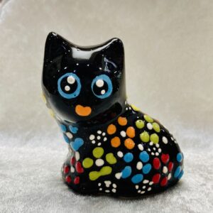 黒色の猫と、背中の庭